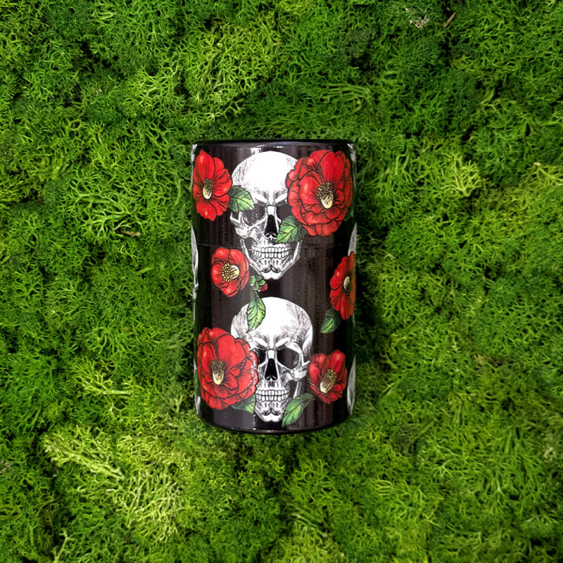 barattolo in plastica teschi e fiori rossi